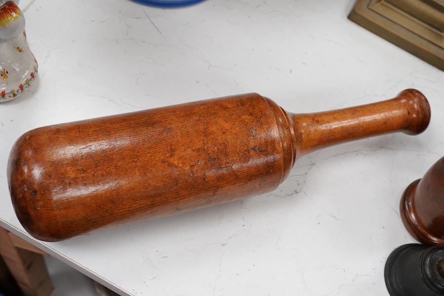 Sundry items to include a large pestle, spice grinder, flat iron on stand, bronze mortar and three other items, largest 42cm in length